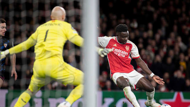 Bukayo Saka pictured (right) scoring for Arsenal in a 2-0 win over Sevilla in November 2023
